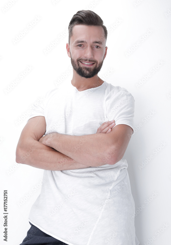 happy young man resting on a white screen happy young man resting on a white screen