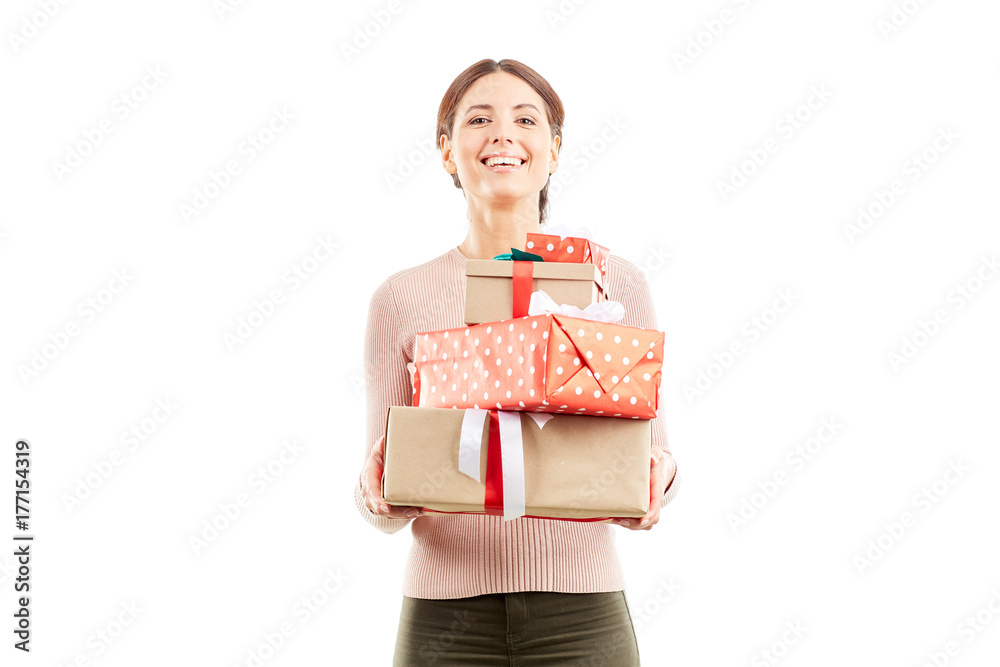 Portrait of young woman holding stack of Christmas gifts Portrait of young woman holding stack of Christmas gifts
