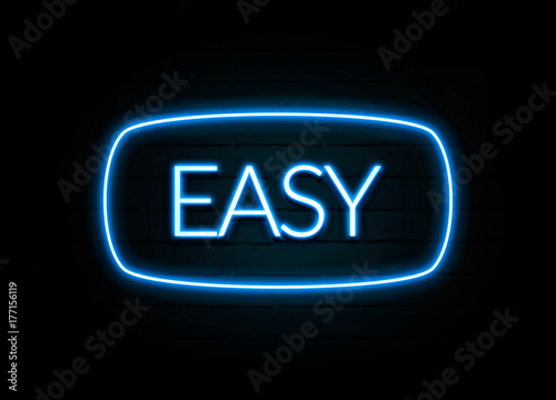 Easy - colorful Neon Sign on brickwall