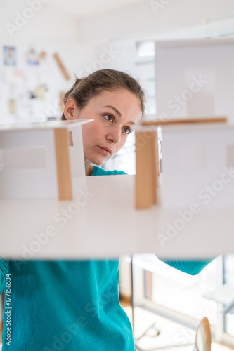 Portrait of a woman architect working on a construction project