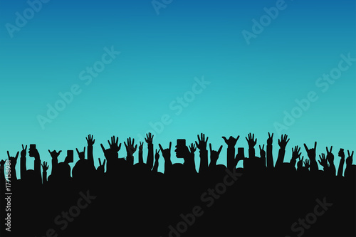 Concert crowd, people silhouettes. Hands with different gestures and smartphones in raised hands. Concert event