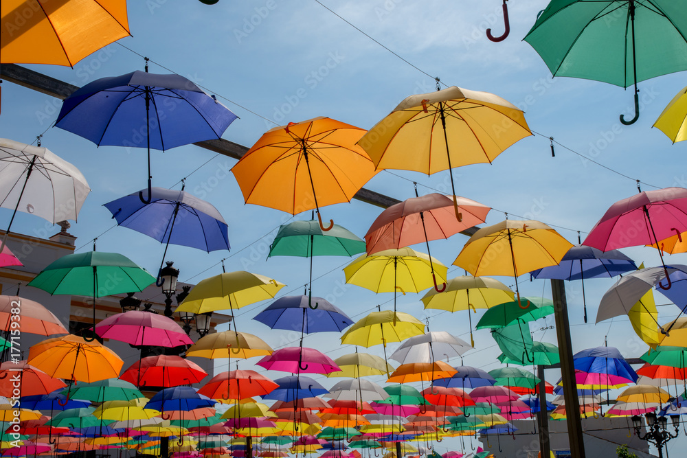 colorful umbrellas in the sky