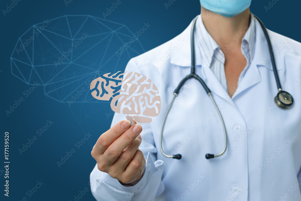 Doctor a hand holding a brain out of paper . Doctor a hand holding a brain out of paper .