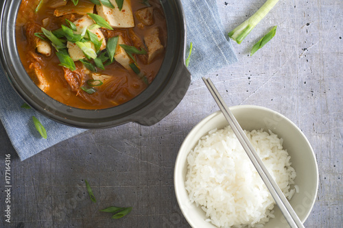 Kimchi jjigae served with rice photo