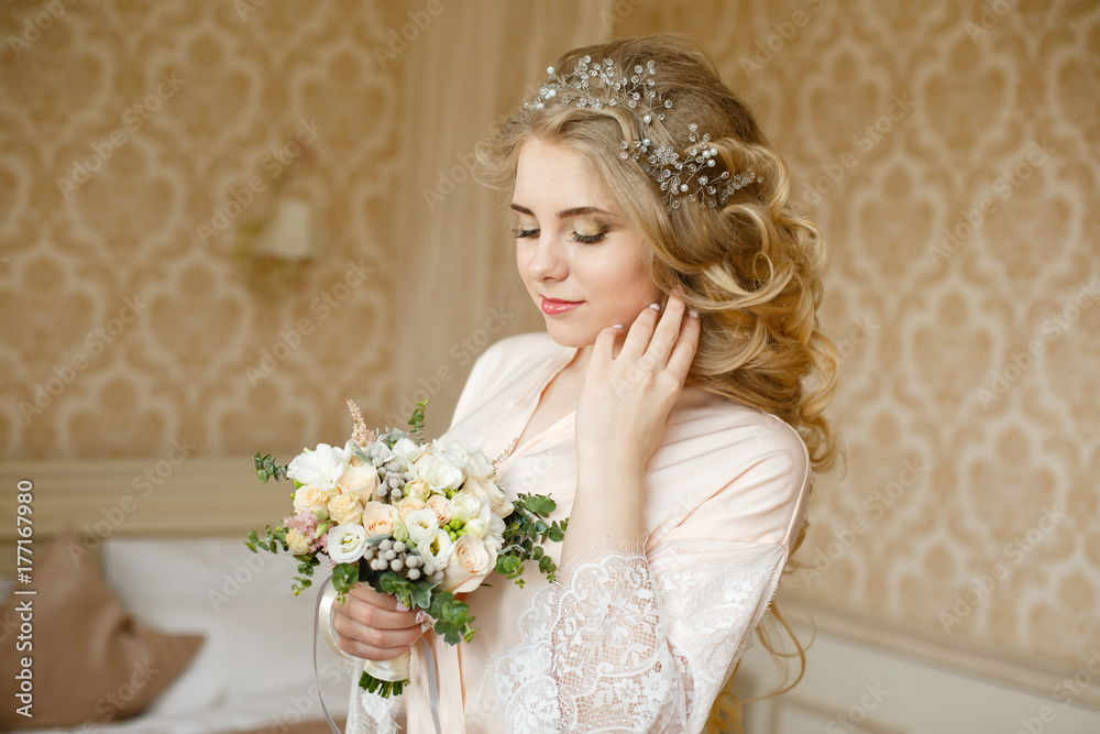 Beautiful young Bride with blonde hairs in a bedroom. Classic white wedding dress. Half-length portrait Beautiful young Bride with blonde hairs in a bedroom. Classic white wedding dress. Half-length portrait