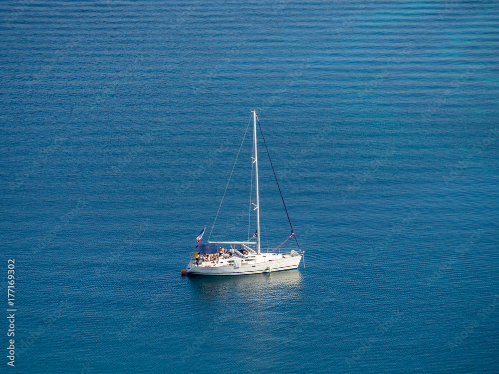 Obraz premium Sailing yacht in Croatia, windy summer on the boat between rocky islands of the Mediterranean sea