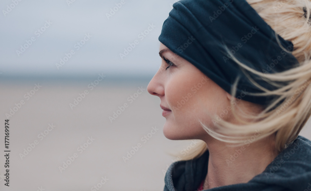 Close-up portrait of a focused female runner Close-up portrait of a focused female runner
