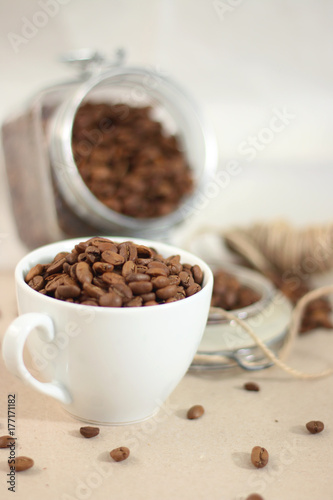 Coffee cup and beans brewing