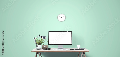 Computer display and office tools on desk. Desktop computer screen isolated. Modern creative workspace background. Front view.