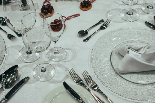 Serving of the festive table.Christmas table setting photo