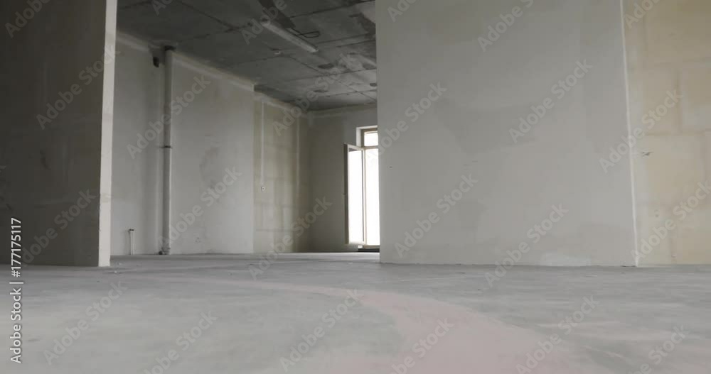 Empty sunny room without finishing in new apartment house. Empty sunny room without finishing in new apartment house.