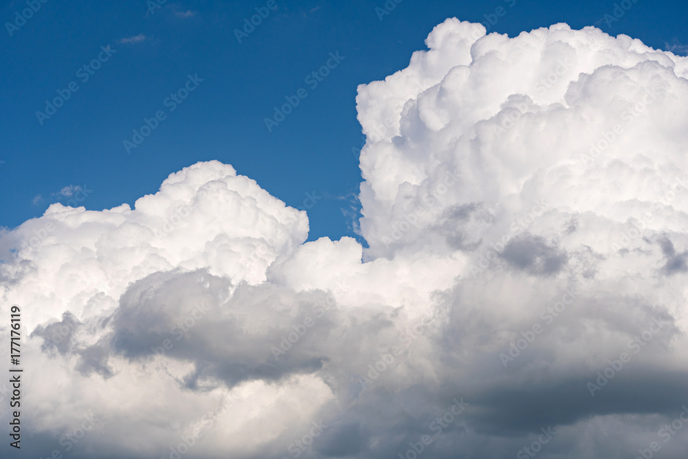 Sunny weather with cumulus clouds on blue sky Sunny weather with cumulus clouds on blue sky