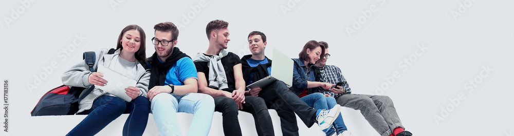 Causal group of people sitting on the floor isolated Causal group of people sitting on the floor isolated