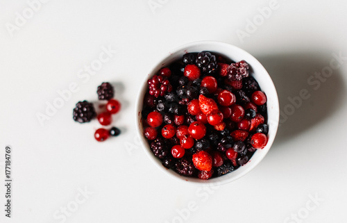 A bowl of red fruit