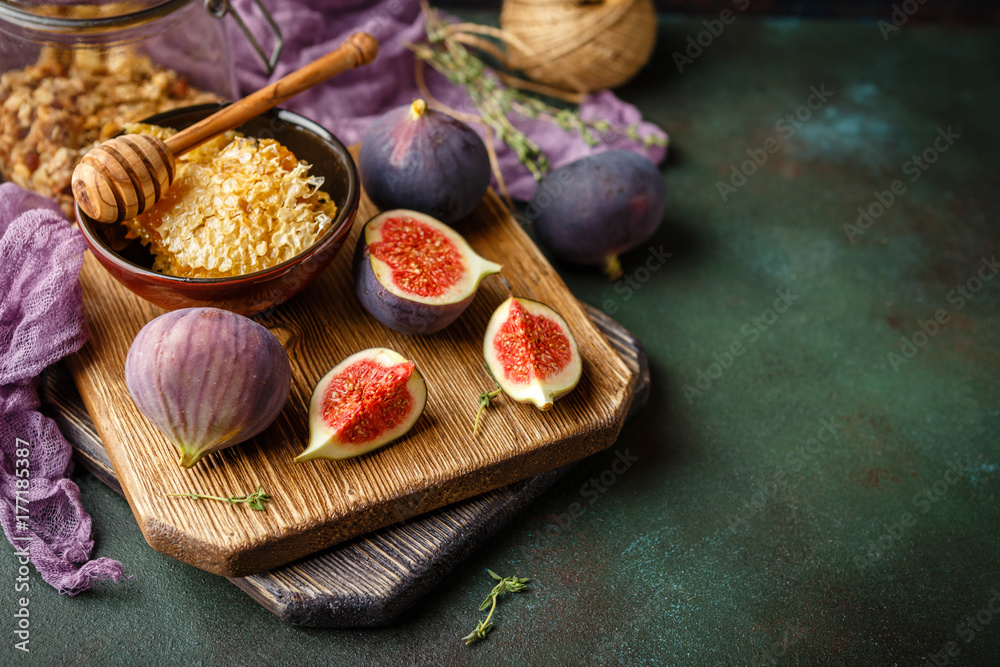 Juicy fig fruits on a dark background Juicy fig fruits on a dark background
