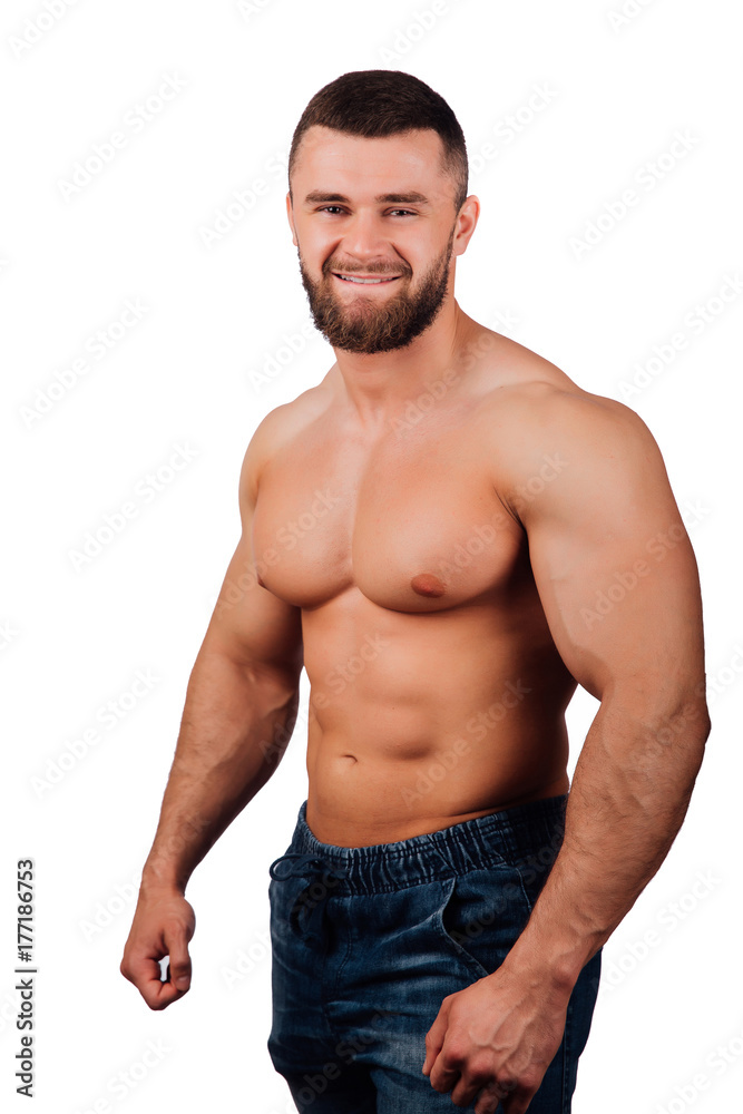 Portrait of a strong bearded male fitness model, torso. Portrait of a strong bearded male fitness model, torso.