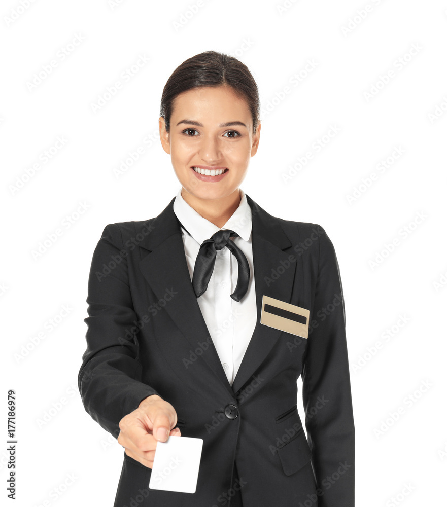 Female hotel receptionist with card on white background