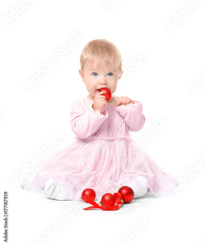 Adorable baby playing with ...