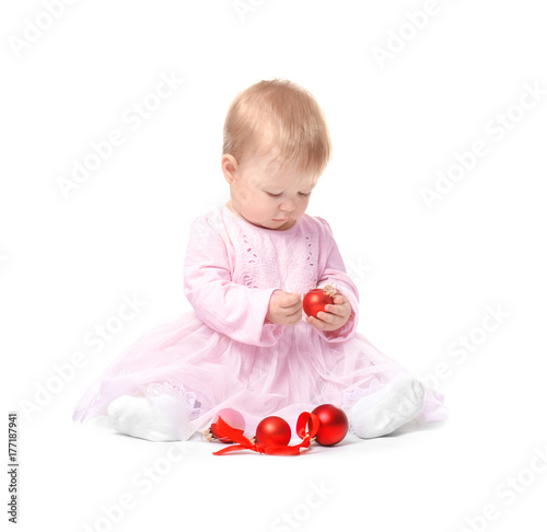 Adorable baby playing with ...