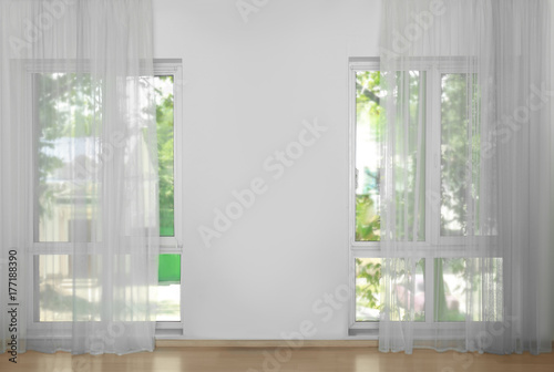 Fototapeta Naklejka Na Ścianę i Meble -  Windows with beautiful curtains, indoor