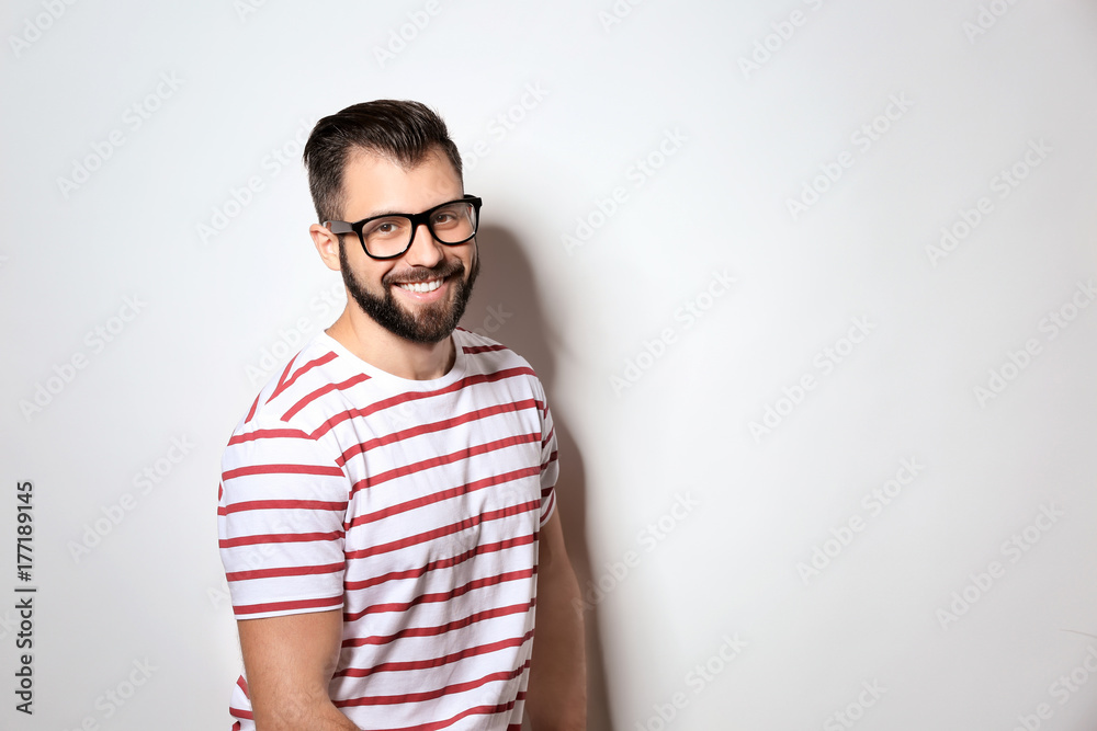Handsome man on light background Handsome man on light background
