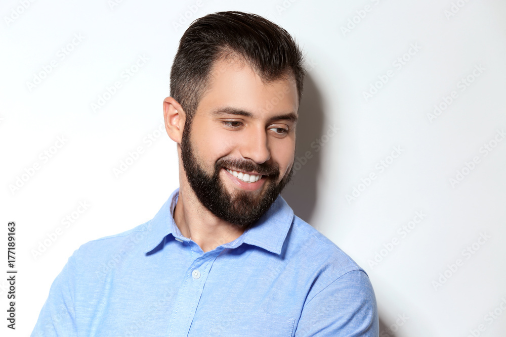 Obraz premium Handsome man on light background