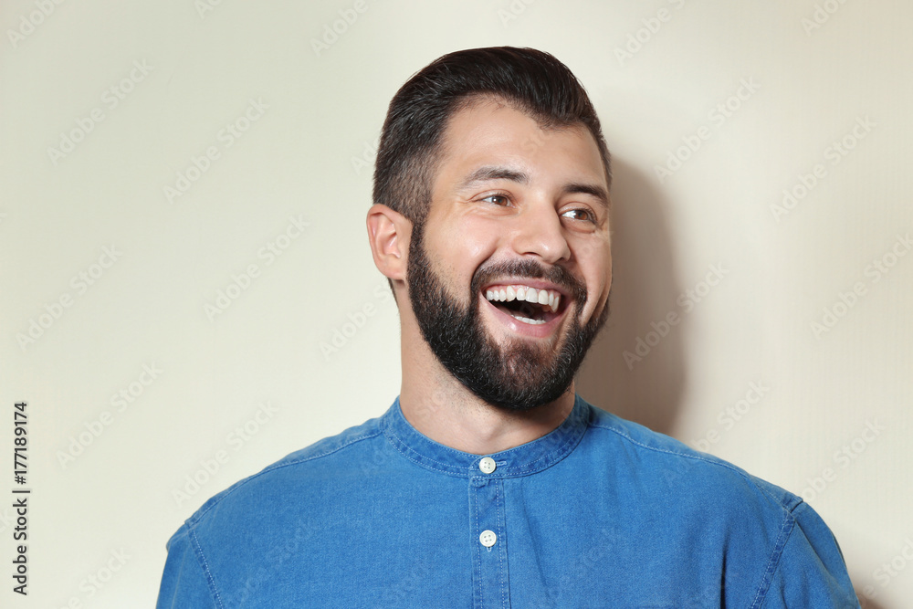 Fototapeta premium Handsome man on light background