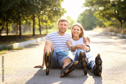 Young couple with roller sk...