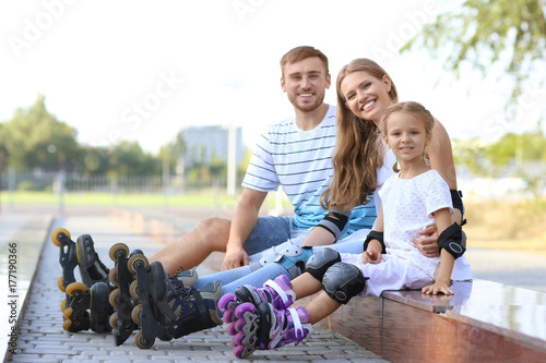 Family with roller skates i...
