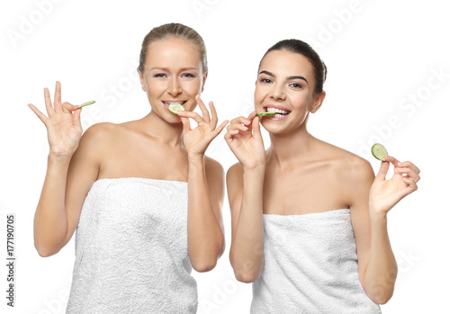 Young women with cucumber s...