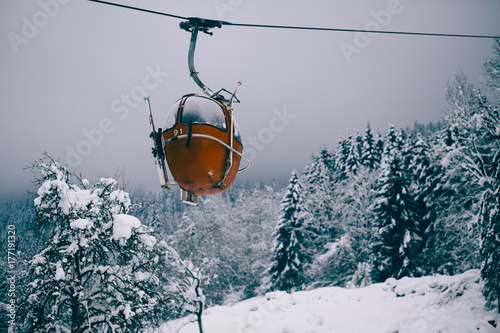 Red Skilift in Snow Forest photo