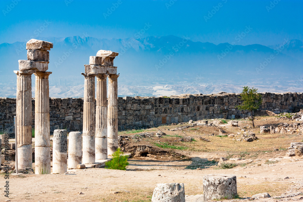 Ancient Amphitheater in the ancient city of Hierapolis. Summer. Pamukkale, Turkey. Ancient Amphitheater in the ancient city of Hierapolis. Summer. Pamukkale, Turkey.