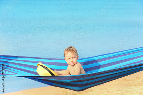 Cute baby boy in hammock on...