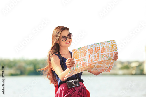 Beautiful young tourist wit...