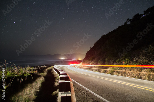 Road and Lights on Oceanside Cliff at Night.