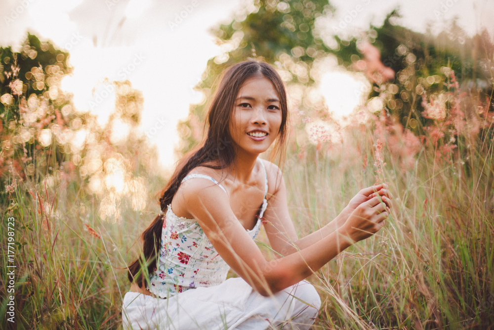 © Nabi Tang/Stocksy - Beautiful young woman in the long grass field on the mountain © Nabi Tang/Stocksy - Beautiful young woman in the long grass field on the mountain