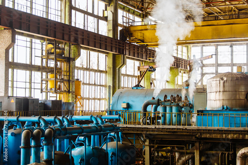 Fotografie Machine room in thermal power plant with electric generators and turbines