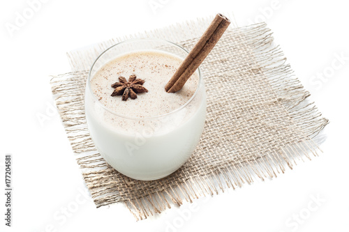 eggnog cocktail in glass isolated on white background