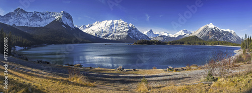 Panoramic Landscape View of upper Kananaskis Lake and Distant Snowy Mountain Tops from Picnic Area in Peter Lougheed Provincial Park, Alberta, Canada photo