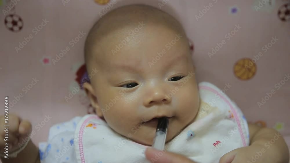 Children take medicine and cry baby of children bed.