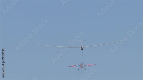 Airplane towing glider for take-off photo