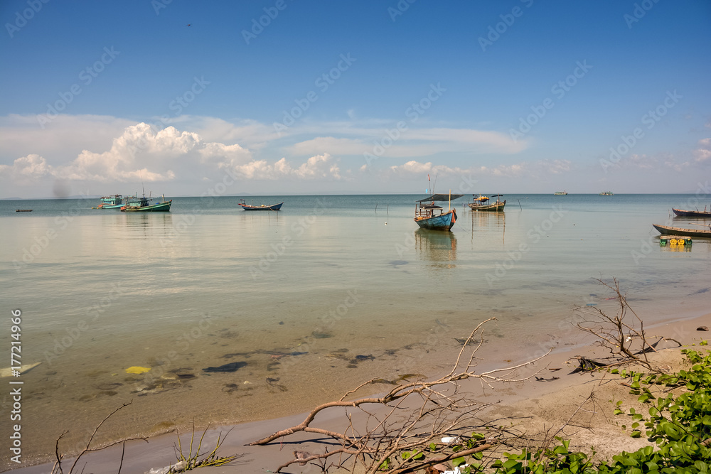 Vietnamese Fishing Boats in Calm Azure Sea by Beach