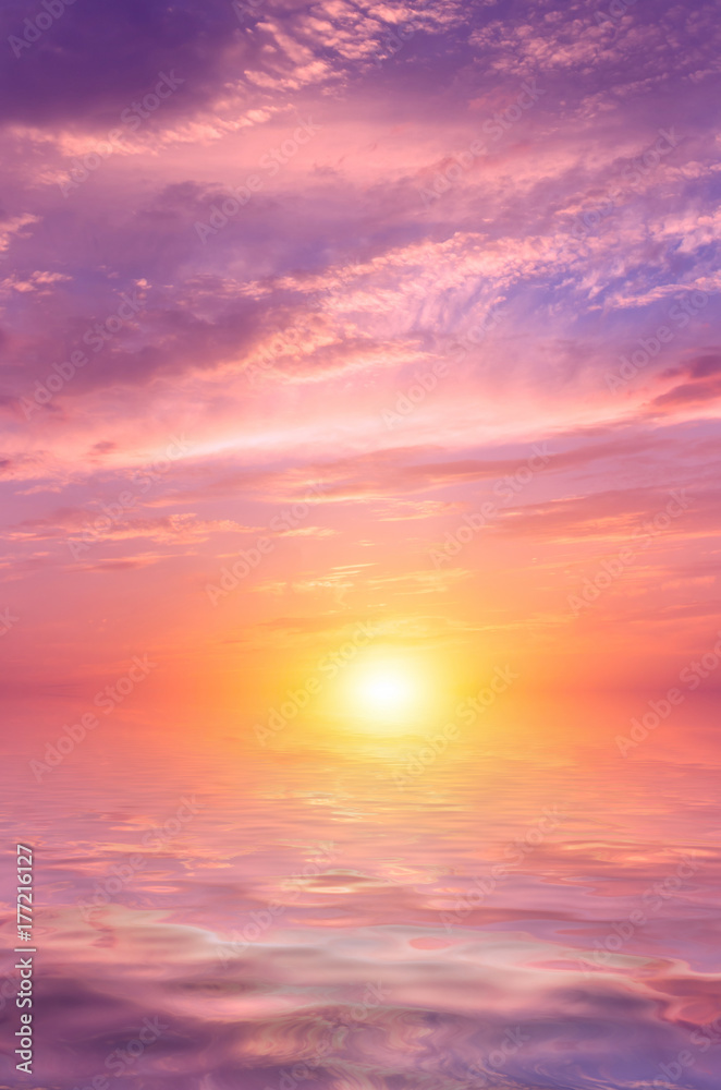 Fototapeta premium Pink sunset with beautiful, colorful clouds over the sea.