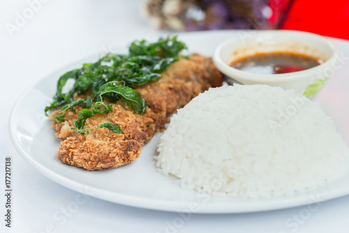 Thai food, Fried chicken with basil crispy and rice. Selective focus.