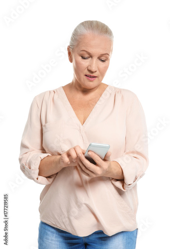 Senior woman using cell pho...