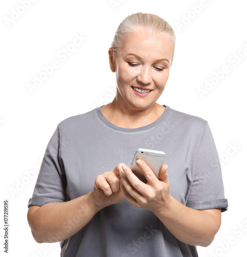 Senior woman using cell pho...