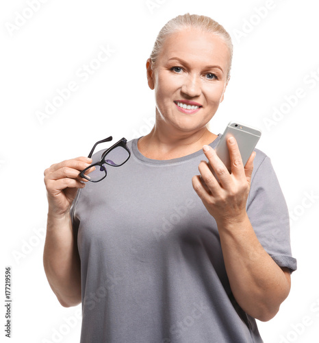 Senior woman with her cell ...