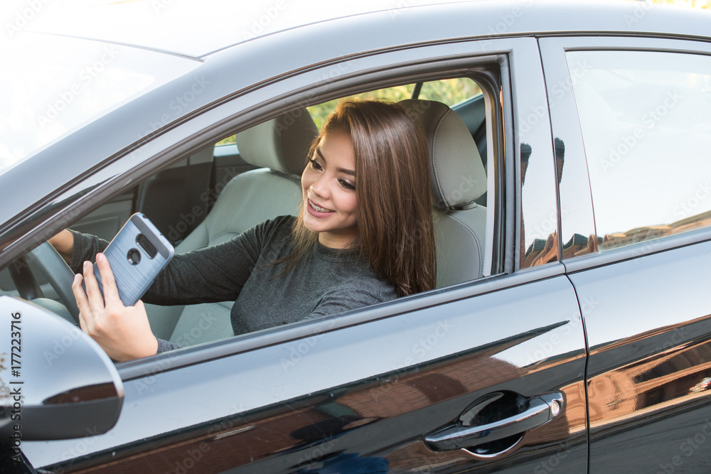 Teen Girl Driving Car While Texting