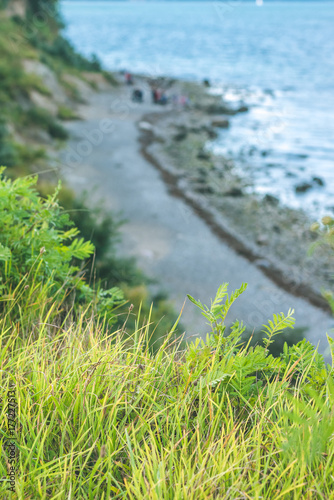 Baltic coastline. Escarpment slope lead to pebble beach. Baltic sea bay. Luebeck - Travemuende, Germany