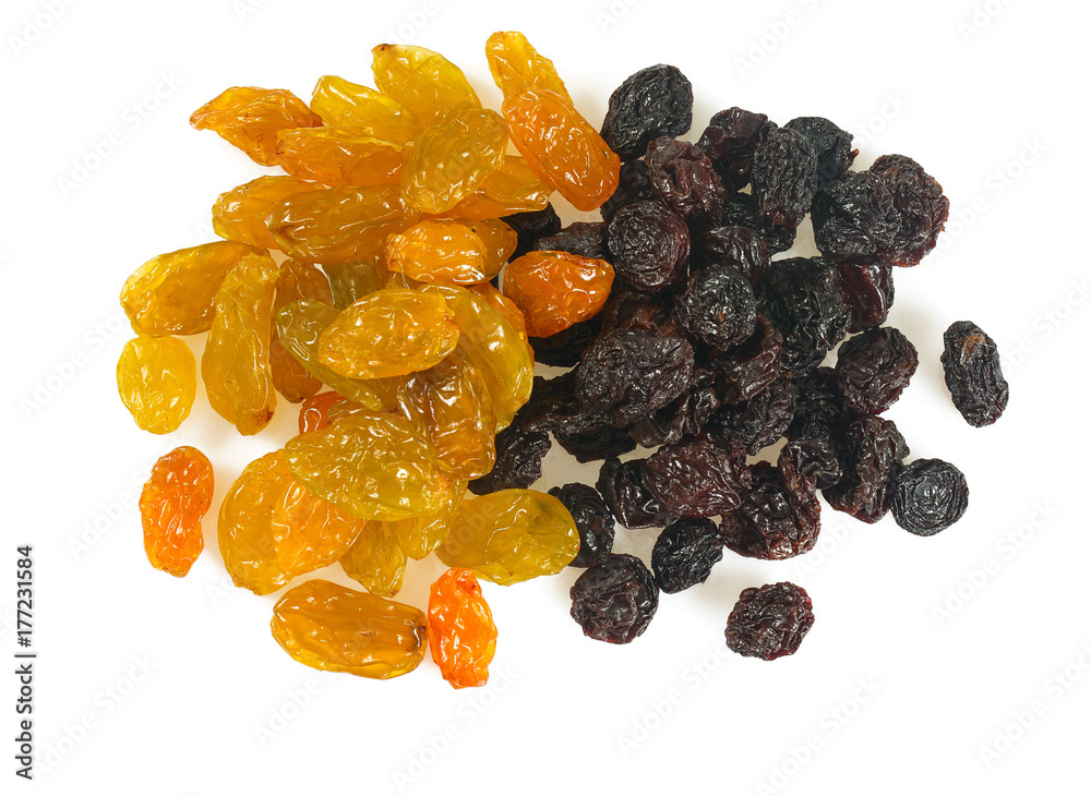 black and yellow raisins isolated on white black and yellow raisins isolated on white